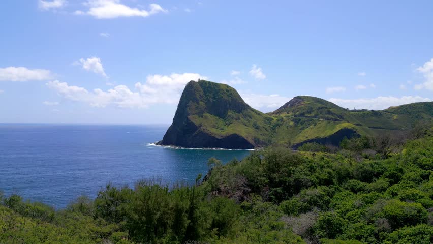 Dramatic Aerial View of the Iconic Puʻu Koaʻe Peak and Lush Green Coastline of West Maui, Hawaii