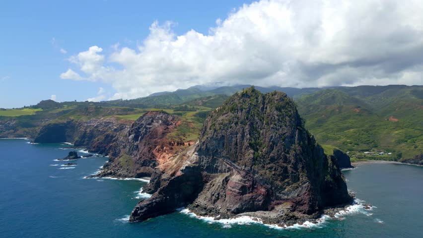 Dramatic Aerial View of the Iconic Puʻu Koaʻe Peak and Lush Green Coastline of West Maui, Hawaii