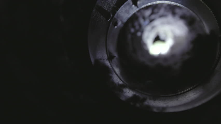 Close-up image of lint buildup inside a dryer vent, highlighting a common household fire hazard. The photo shows accumulated dust, fibers, and debris in the vent pipe, emphasizing the importance of re