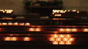 Candlelight Memorial Day. Candles burning warmly in church. High quality 4k footage - Powered by Shutterstock - Get 15% off with code: PIKWIZARD15