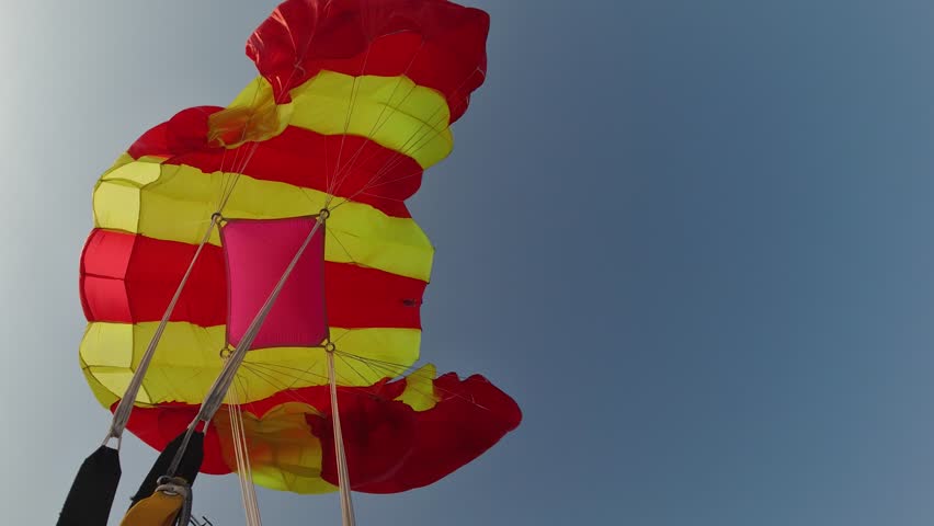 The parachute opened during a parachute jump. Point of View.