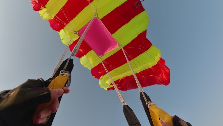The parachute opened during a parachute jump. Point of View.