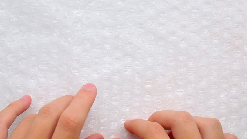 Male hands systematically popping bubble wrap for stress management. Rhythmic bubble bursting sequence designed for therapeutic relaxation and fun. Part 3 of 3. Stress Relief Bubble Wrap ASMR
