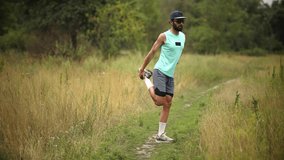 Runner Doing Quad Stretch Warming Up. Trail Runner Stretching. Outdoor Fitness Workout. Leg Stretch. Warmup Before Workout Run. Running Exercise. Fitness Sport Activity. Runner Flexibility Stretching - Powered by Shutterstock - Get 15% off with code: PIKWIZARD15