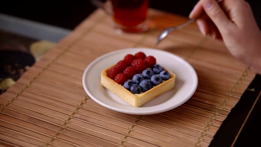 Eat Berry Tart. Delicious Pastry With Raspberries And Blueberries. Sweet Dessert Tart. Enjoying Sweet Treat. Delicious Bakery Product. Fine Dining Dessert. Sweet Tangy Flavor. Tart With Fresh Berries
