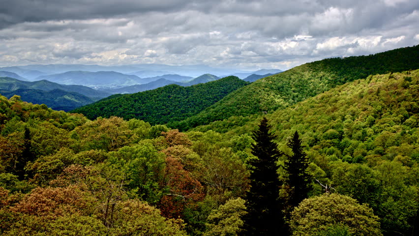 An emotional drone pass over the rainy, mist-shrouded Smoky Mountain ranges.
