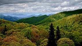 An emotional drone pass over the rainy, mist-shrouded Smoky Mountain ranges. - Powered by Shutterstock - Get 15% off with code: PIKWIZARD15