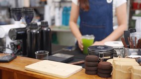 Small business entrepreneur barista coffee shop cafe restaurant. Customer using credit card on smartphone app making online banking payment buy beverage at cashier counter. Cashless payment technology - Powered by Shutterstock - Get 15% off with code: PIKWIZARD15