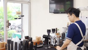 Small business entrepreneur coffee shop cafe and restaurant. Asian woman waitress turning open sign to closed and using towel sweeping glass door with cleaning coffee maker equipment for closing store - Powered by Shutterstock - Get 15% off with code: PIKWIZARD15