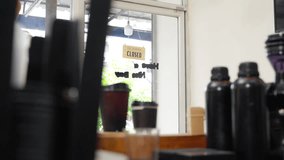 Small business entrepreneur coffee shop cafe and restaurant. Asian woman waitress turning open sign to closed and using towel sweeping glass door with cleaning coffee maker equipment for closing store - Powered by Shutterstock - Get 15% off with code: PIKWIZARD15