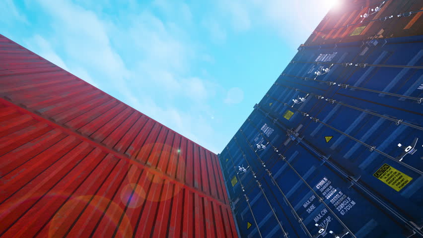 Airplane Flying Over Stacked Shipping Containers at Port