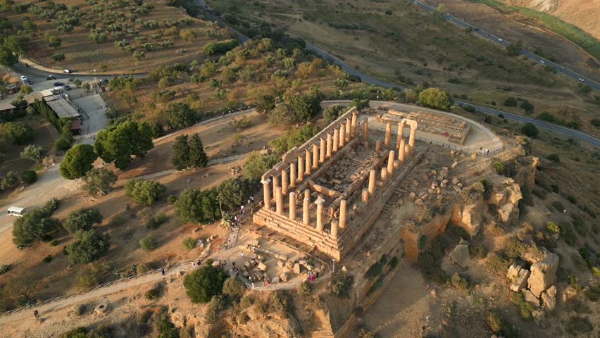 4K Aerial of the Valle Dei Templi at sunset, in Agrigento, Sicily in July 2025