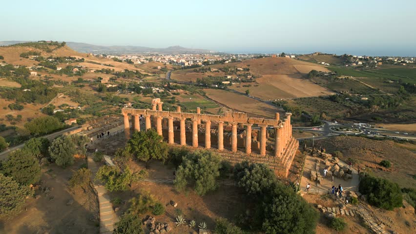 4K Aerial of the Valle Dei Templi at sunset, in Agrigento, Sicily in July 2025