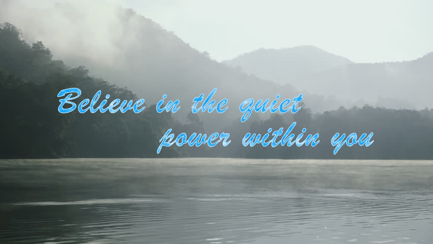 Inspirational quote over calm lake with misty mountains and forest background in early morning light