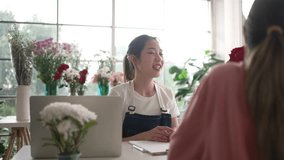 Young entrepreneurs are working at florist shop. Small business and leisure activity. - Powered by Shutterstock - Get 15% off with code: PIKWIZARD15