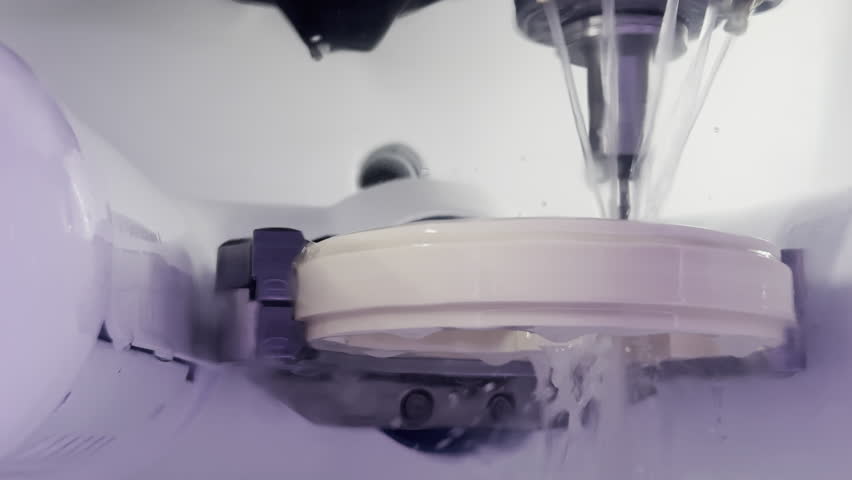 A Machine That Performs Drilling and Cutting for Prosthetic Tooth Molds Health in a Dental Laboratory