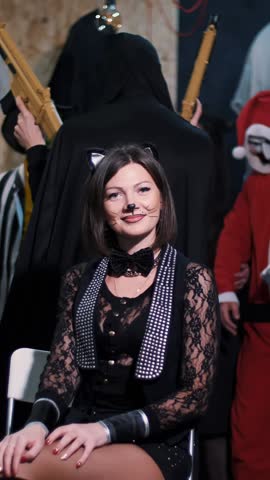 Halloween party, photo session, young people dressed up in scary costumes and made a horrific make-up.