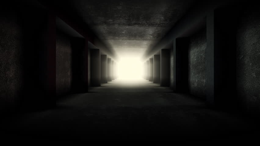 Travelling along a dark underground secret tunnel with glowing light on an endless loop.