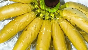 Ripe Bananas in Clear Water. Top View Slow Motion Splash. - Powered by Shutterstock - Get 15% off with code: PIKWIZARD15