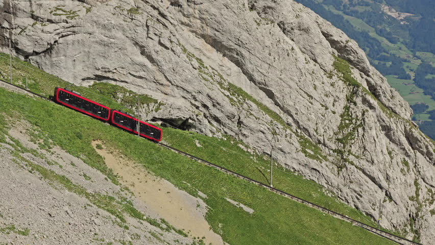 Red Cogwheel Train on Mount Pilatus in Switzerland