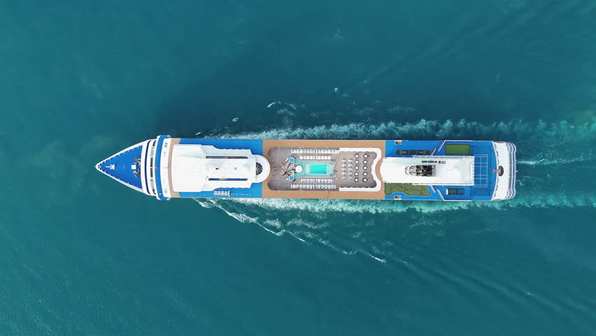 Aerial view of beautiful white cruise ship above luxury cruise in the ocean sea at early in the morning time concept smart tourism travel on holiday vacation time on summer