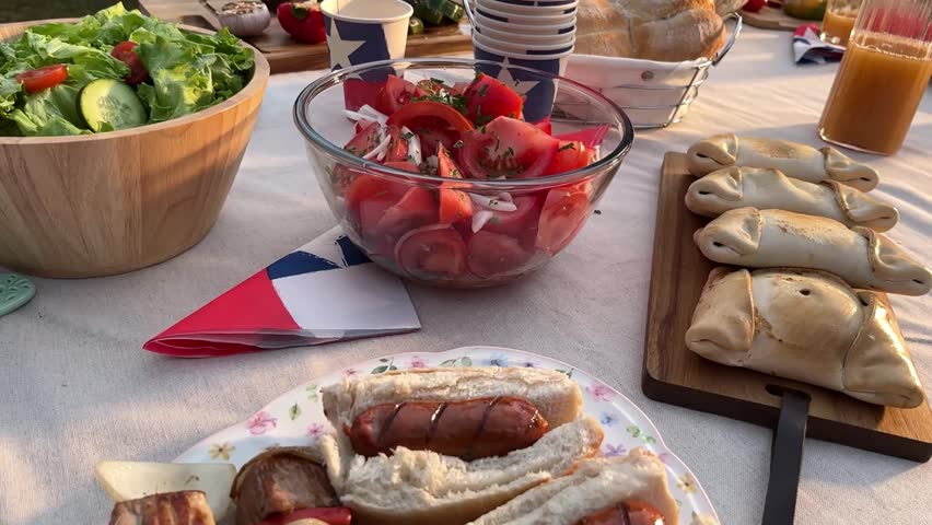 Fiestas Patrias chile grill parrilla meat chorizo table empanadas pebre