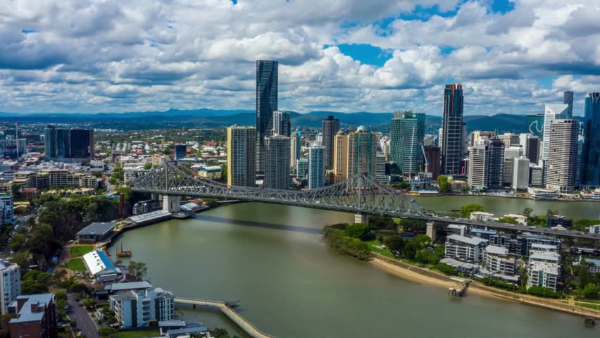 Timelapse aerial flyover shot showing Brisbane river with story bridge . Brisbane Queensland Australia Timelapse aerial flyover shot. 