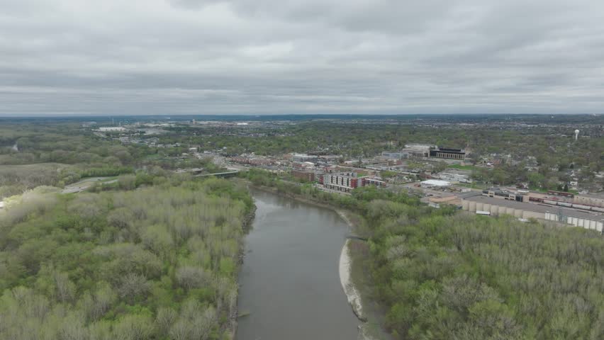Flying Over Minnesota River Towards The Downtown Shakopee In Minnesota, USA. - aerial shot