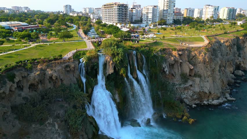 4K Cinematic aerial video capturing the unique beauty of Lower Düden Falls where freshwater meets the Mediterranean -Antalya - Turkey_01