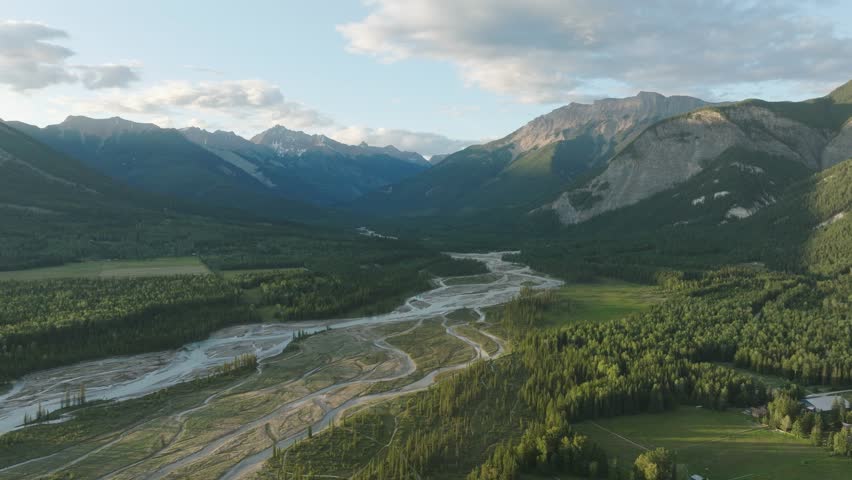 Aerial View Of Blaeberry River, Green Forest And Mountain Range In Canadian Rockies Near Golden In British Columbia, Canada. -