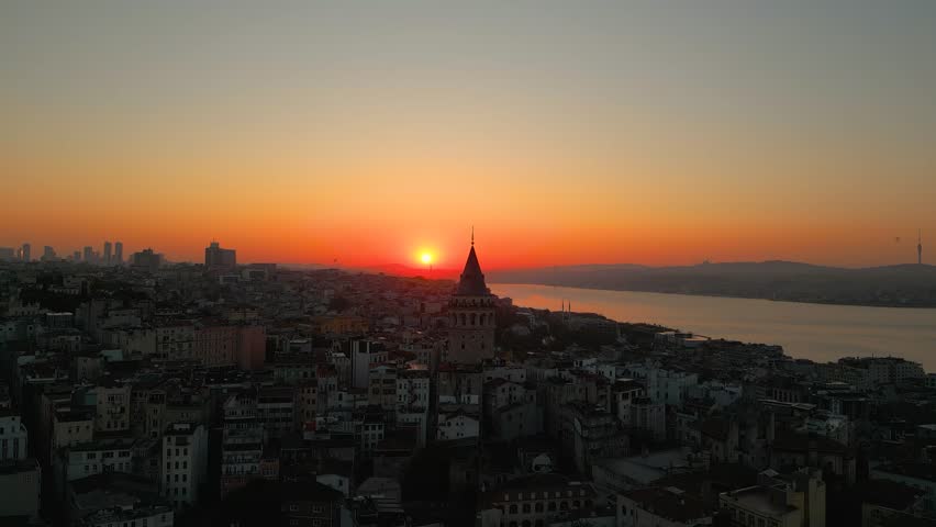 4K Cinematic drone footage featuring Istanbul’s iconic Galata Tower rising above the historic Beyoğlu district at Golden Hour. Istanbul -Turkey_04
