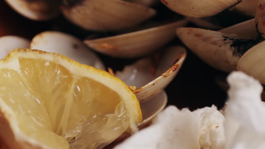 Marinara mussels with garlic, sauce, lemon and parsley. Classic spanish and French meal macro close up.