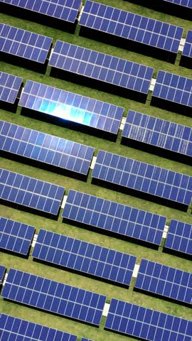 Blue solar panels. Alternative green clean source of energy. Aerial top view. Vertical footage