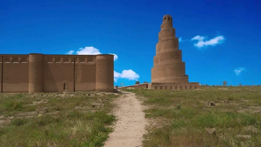 Historical spiral minaret and surrounding areas in Samarra, Iraq during daytime Shrines, Mosques and Landmarks in Iraq Top of minaret with blue sky