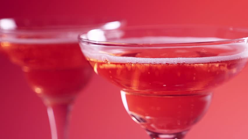Closeup of glass with sparkling rose wine