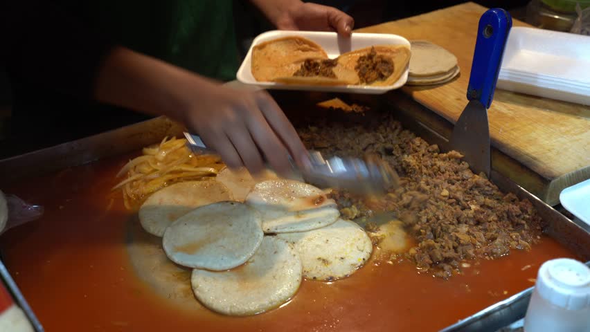 Tacos made in food stand in Central America. Guatemalan street tacos.