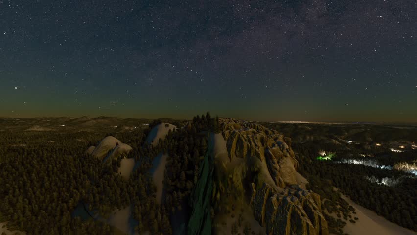 3D - Night aerial drone view of the snow at Mount Rushmore National Memorial in Keystone. South Dakota. United States