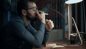 Man With Eye Strain At Computer. Tired Professional Working Late. Overworked Employee Digital Fatigue. Long Hours At Desk. Eye Rubbing Gesture. Mental Health. Stressful Work Environment Exhaustion - Powered by Shutterstock - Get 15% off with code: PIKWIZARD15