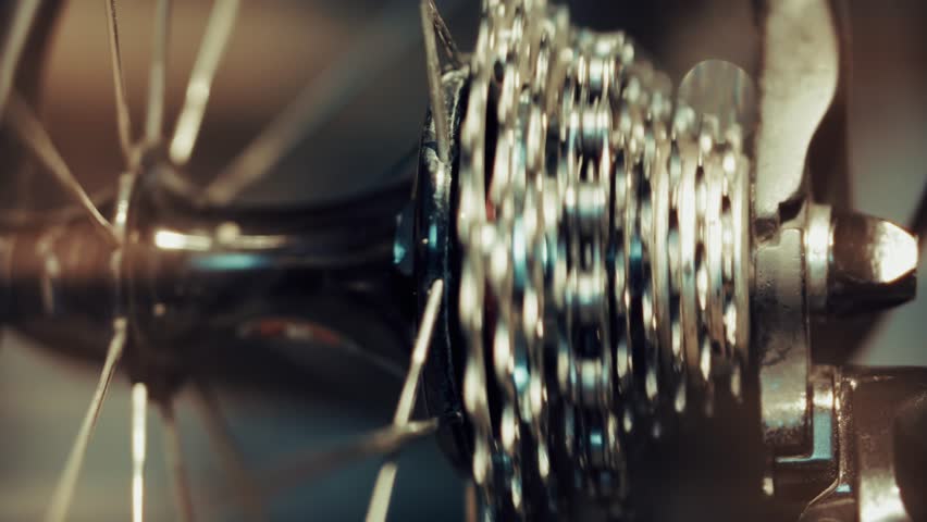 Bicycle Cassette In Motion Spinning Bike Gears. Cycling Technology And Mechanics. Drivetrain System Bicycle Repair And Maintenance. Bike Components Sports Equipment Hobby And Sport. Sprocket And Chain