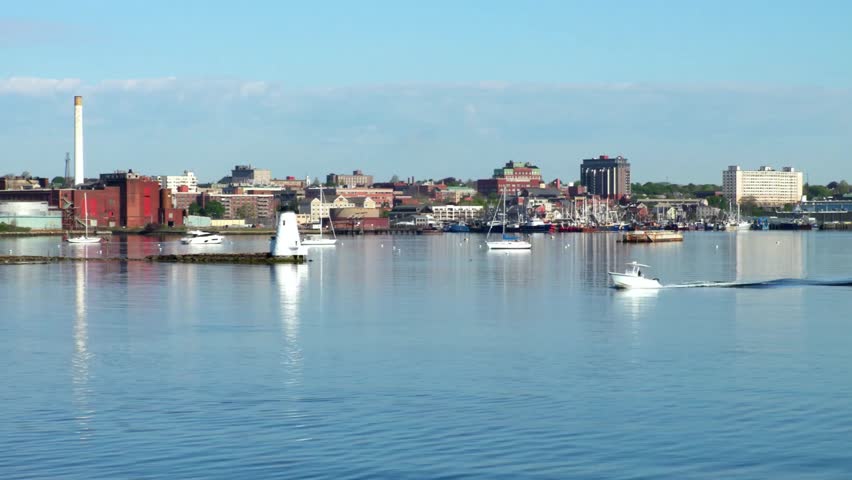 Panoramic view of portland maine cityscape along the waterfront on a sunny day