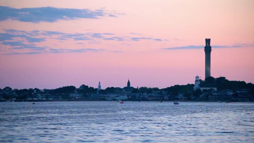 Sunset over a lighthouse on the coast of cape cod in massachusetts