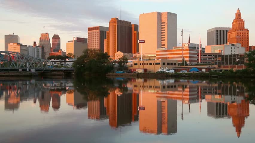 Newark new jersey cityscape reflecting in the passaic river at sunset