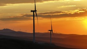 Exploring Wind Energy Potential in Elevated Urban Areas: Assessing the Feasibility and Environmental Benefits of Harnessing Wind Power from Mountainous Locations for Sustainable City Development 4K - Powered by Shutterstock - Get 15% off with code: PIKWIZARD15