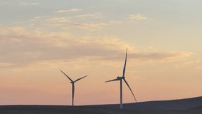 Exploring Wind Energy Potential in Elevated Urban Areas: Assessing the Feasibility and Environmental Benefits of Harnessing Wind Power from Mountainous Locations for Sustainable City Development 4K - Powered by Shutterstock - Get 15% off with code: PIKWIZARD15