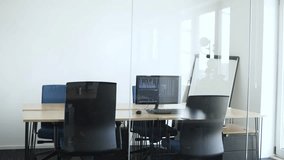 Empty office, tech and table in meeting room in business seminar, conference or company planning. Closed, computer laptops in agency for finance management, training or workshop. Corporate boardroom - Powered by Shutterstock - Get 15% off with code: PIKWIZARD15