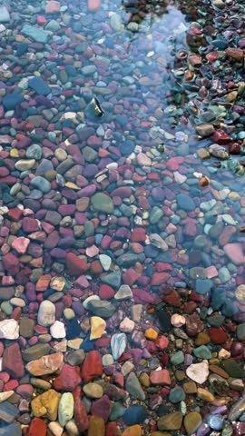the beauty of the pebbles under the sea as well as the mountain views and fresh air from the shady trees
