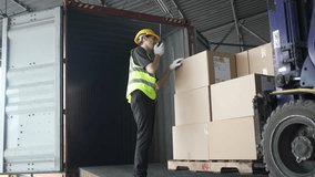 Blue collar workers are working at warehouse. Logistics, transportation. - Powered by Shutterstock - Get 15% off with code: PIKWIZARD15