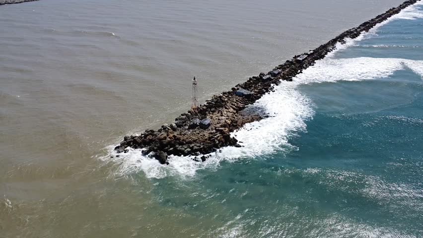 Drone shot over Bocas de Ceniza outside the city of Barranquilla, Colombia, intersection of Atlantic Ocean and Magdalena River