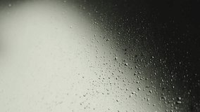 Close-up of raindrops running down glass or window. Close-up of fogged glass during bad weather. - Powered by Shutterstock - Get 15% off with code: PIKWIZARD15