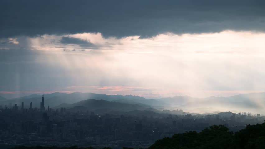 Experience dramatic rain and light over Taipei from Shulin Dadao Mountain. Filmed in summer 2025, this video captures misty rain and stunning light effects over the city.
